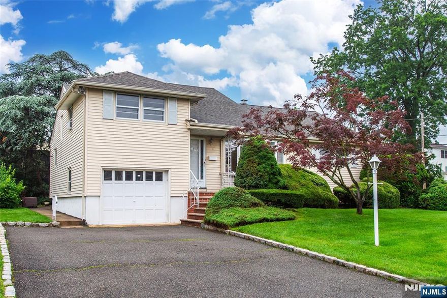 Welcome to this Expanded Ranch situated on a corner lot in a quiet residential area providing comfortable living. Main level offers Eat In Kitchen, Spacious LR, DR great for entertaining. 2 Bedrooms, Full Bath, Laundry and large family room completes the main level. Move on up to the second level with a spacious bedroom which includes full bath & another bedroom on top level. Large full finished basement with summer kitchen, half bath and lots of storage. Hardwood floors underneath carpeting, central air, baseboard/forced hot air, newer roof, hot water heater & furnace. Close to highways, NYC & Transportation - This cozy 1 family expanded ranch is ready for your personal touches & TLC. Home Being Sold "AS IS" with no known issues - Environmental/Structural Only To Be Addressed If Any.