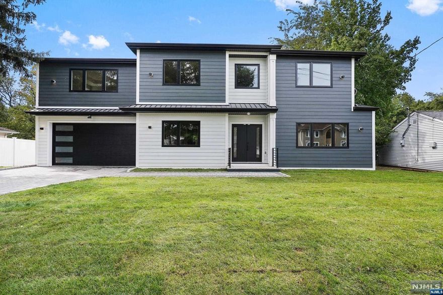 Approx 3,000 sq ft New construction home over portion of original exiting foundation- 5 bedrooms suites- each with private bath & walk in closet! 5 full baths and 2 1/2 baths in total. Main level has spacious Living room formal dining room, half bathroom, Gorgeous kitchen with island & quartz tops with stainless appliances. Finished basement with recreation room and half bath. Principal master bedroom has tray ceiling, dual walk-in closet, double head shower. 2 car built in garage with ample parking on paverstone driveway. Andersen windows, Hardwood floors, tiled baths, 2 separate gas HVAC heating and cooling systems, 200 amp electric. Private fenced in yard with new sod.