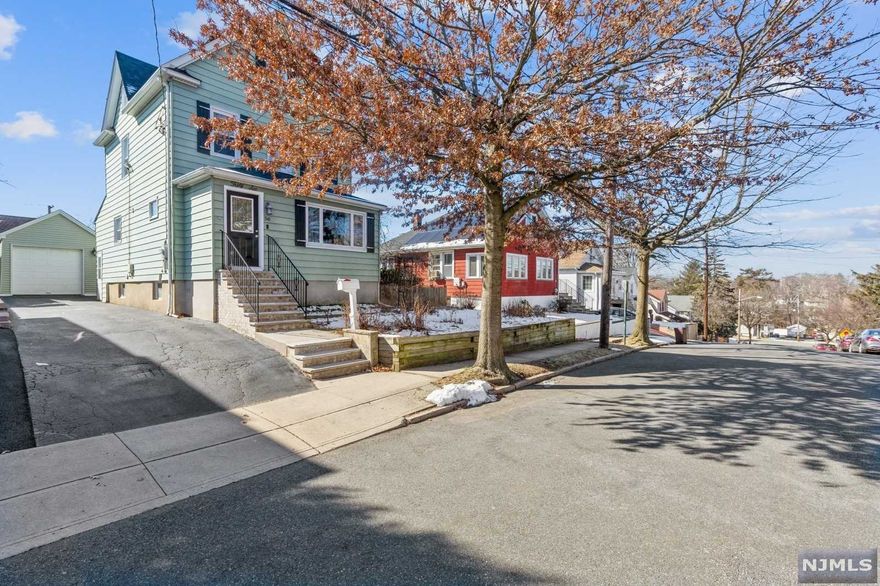 Welcome to this beautiful bright home. It is convenient to New York. It has been updated with hardwood floors, freshly painted, and a newer roof. It has a living room, dining room, den, modern eating kitchen, master bedroom upstairs, full bath, and 2 more bedrooms. It has a walk up attic and a full finished basement with a laundry room.