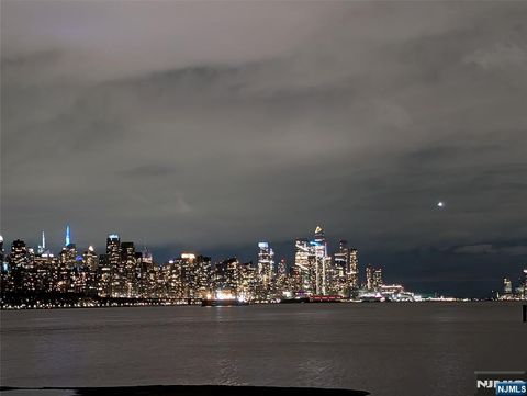 Photo of 6407 City Place #6407, Edgewater, NJ 07020 (MLS # 26011763)