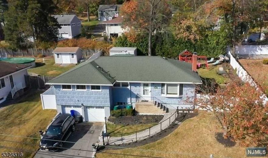 Experience modern living at its finest in this beautifully updated home at 276 Fairview Ave, Cedar Grove Twp., NJ. This spacious residence features a newly renovated bathroom with sleek, contemporary finishes, central HVAC for year-round comfort, and a large, fully finished basement perfect for additional living space or entertainment. The property also offers ample garage parking and storage, ensuring convenience and practicality. Ideally located near shopping, dining, and local amenities, this home combines style, comfort, and accessibility. Don't miss your chance to make it yours schedule a viewing today!