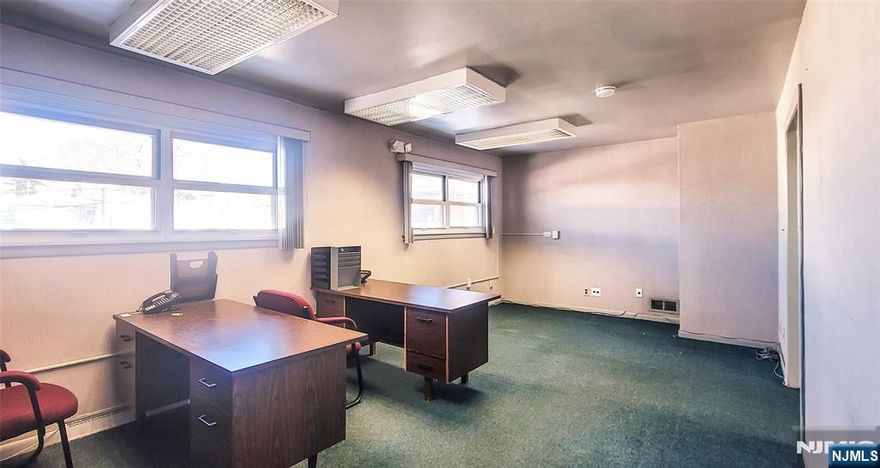Elisa Cho and Echo Realty present an amazing opportunity! Professional 3-room office suite available in the heart of Hackensack, NJ. This well-maintained space features a welcoming entry foyer/waiting area, three private offices, and two bathrooms on the 2nd floor (walk-up): ideal for medical, legal, accounting, therapy, or general professional use. The layout offers functional flow with ample closets and built-in cabinetry for convenient storage. Two outdoor unassigned parking spaces are included for added convenience. All utilities are included in the rent, providing simple and predictable monthly expenses. Just one month security deposit required for qualified tenants. Tenant responsible for town and Certificate of Occupancy (CO), and insurance requirements. Prime location with easy access to major highways, public transportation, and local amenities. Ready for immediate occupancy!