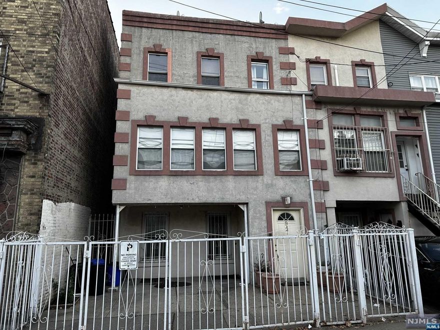 Three family home in the heights. Each unit is a 2 bed, 1 bath apartment. Separate utilities. Offers one gated parking space. Private patio out back