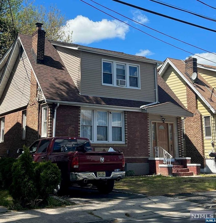 Three bedroom Colonial 2 bathrooms, Formal Dining room, Livingroom & Eat-In-Kitchen. Gas heat. Freshly painted,. Ample driveway plus Oversized garage with 3 spaces. more space in the basement to make a Huge family room.