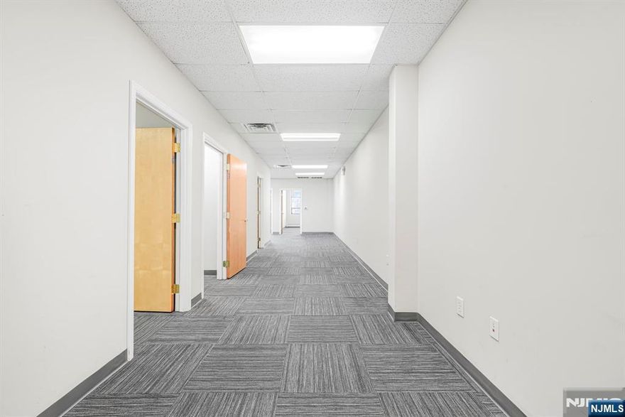 1,285 sqft second-floor suite-ideal for chiropractors, physical therapists, or professional offices. Features four private offices and a flexible layout designed for productivity and client-focused services. Located in the prominently positioned One Lethbridge Plaza, a refreshed professional hub with modern common areas and a polished atmosphere. Exceptional visibility on Route 17 with easy access to Route 287 and the NYS Thruway. Modified gross lease. $2624/mo + CAM ($237/mo). Utilities included in base rent. 3+ yr term.