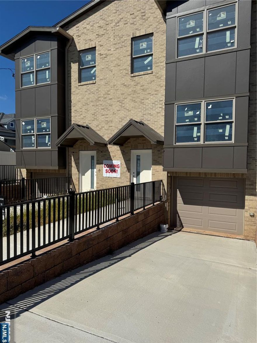 ALL NEW CONSTRUCTION FROM THE GROUND UP-LARGE BRIGHT ROOMS-PLEANTY OF SUNSHINE THROUGHOUT. HARDWOOD OAK FLOORS-CLOSETS IN EVERY ROOM- THREE BEDROOMS AND 2 FULL BATHS ON TOP FLOOR-LAUNDRY ON TOP FLOOR-LIVING ROOM-DINING ROOM-HUGE CENTRE ISLAND KITCHEN-STAINLESS STEEL APPLIANCES- FULL FINISHED BASEMENT WITH FULL BATH AND HUGE FAMILYREC ROOM-GARAGE WITH EV CHARGER-DRIVEWAY-FULLY FENCED BACKYARD. NY TRANSPORTATION ON CORNER-0NE BLOCK TO ELEMENTARY SCHOOL-SHORT WALK TO TOWN CENTRE