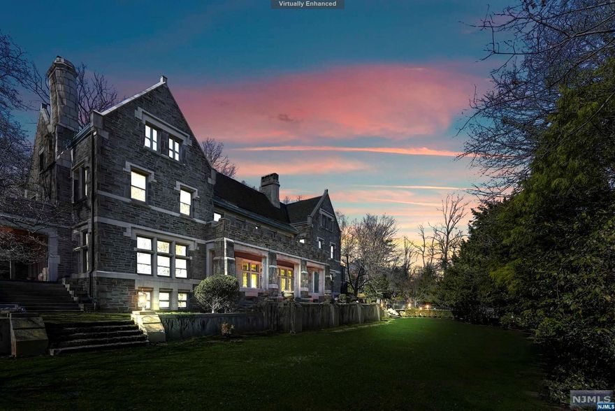 Indulge in the epitome of opulent living w/ "The Castle at the Crossroads," a masterpiece crafted by renowned architects Frank Wallis and William J Rogers, poised for a discerning owner to bring its restoration to completion. This majestic stone manor exudes luxury at every turn, boasting exquisite natural woodwork, mesmerizing leaded & stained glass windows, adorned w/stained glass medallions, & floors of unparalleled beauty. Step into a world of refined elegance w/formal rooms including a grand LR adorned w/a regal fpl, a DR fit for royalty, and an exquisite Library showcasing original built-ins & stately fpl. The large, meticulously updated Kit is a culinary delight, featuring stainless steel appliances, a spacious center island, and seating for 10, while the Butler's Pantry offers an abundance of bespoke cabinetry. Ascend to the upper levels to discover a sanctuary fit for the most astute homeowner. The Primary Bdr boasts breathtaking views of the iconic NYC skyline, a tranqui