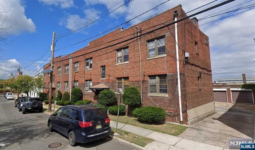 2 Bedroom apartment with combined kitchen and living room on the second floor of a 12 unit apartment building. Will be freshly painted and professionally cleaned. Located on a quiet road close to highways. Covered garage space is included. Vacant. No pets.