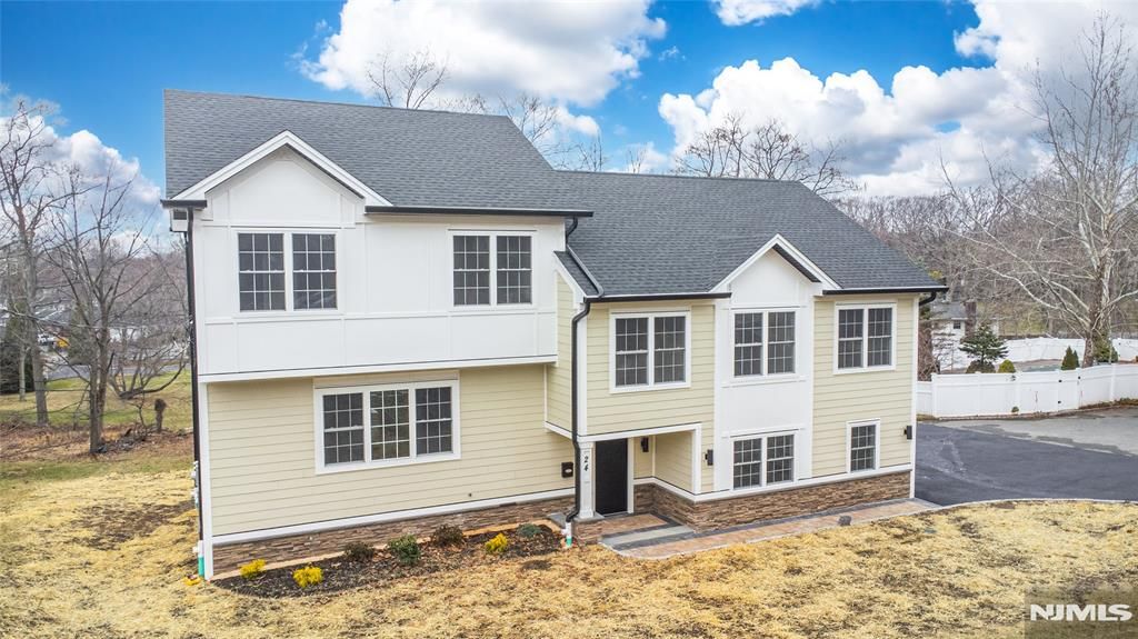 Photo of 24 Shrewsbury Drive, Livingston, NJ 07039 (MLS # 26009054)