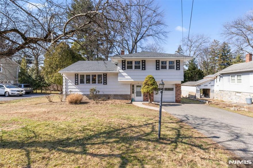 WELCOME TO THIS BEAUTIFUL, MOVE-IN READY HOME IN HIGHLY SOUGHT AFTER HARRINGTON PARK! This oversized three bedroom, two and a half bath Sugar Maple Split Level is set on a quiet, residential street just steps from the townâ€™s highly regarded elementary school. Filled with an abundance of light, its layout is so versatile and lends to an easy flow. The first level offers an entry foyer, coat closet, comfortable family room with full bathroom/laundry room combo, along with access to the garage and basement. The second level features an open floor plan with a spacious living room, dining room and newer kitchen. The primary bedroom with half bath, and two comfortable bedrooms, along with one full bath complete the third level. The brand-new basement has been completely finished, and new high-hat lighting installed throughout the entire home. The hardwood floors were also refinished throughout. NOTHING TO DO BUT UNPACK YOUR BAGS! Harrington Park itself is one of Bergen Countyâ€™s most desirable communities, valued for its top-notch school district, small-town charm, and strong sense of community. With scenic parks, walking paths, swim club, and convenient access to nearby shopping, dining, and NYC commuting options, YOU WILL LOVE LIVING HERE!