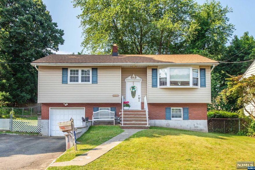 Welcome to Woodland Park for this 3Bed/2Bath Bi-Level located in close proximity to major highways, schools and shopping. The 2nd floor consists of 2 bedrooms, full bath, kitchen, living room, dining room as well as a deck off the dining room. There is plenty of light to go along with this spacious kitchen that features a large island great for entertaining and cooking. The 1st floor features a large bedroom, bathroom as well as a multiple use den with a sliding glass door that goes out to the backyard. The backyard is spacious and private. Don't miss out on an opportunity to get into the desirable town of Woodland Park.