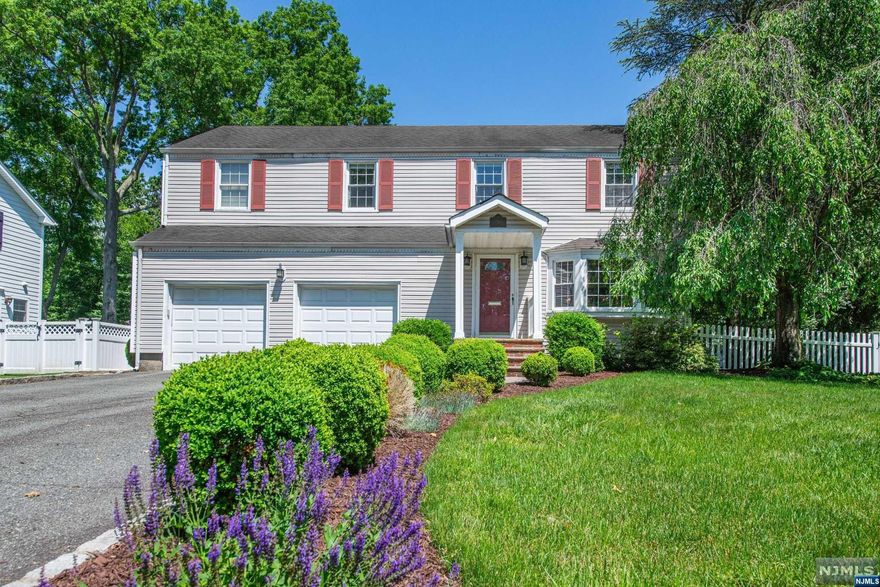 PAY ATTENTION: *RIKER HILL Colonial *.24 Acre Level Lot *2500+ sq ft Living Space *2 Car Garage *4 Generous Bedrooms *Master En-Suite Addition w/WIC *Family Room Addition *2 Zone HVAC *Finished Basement *TREX Deck * Retractable Awning *HOT TUB *Fenced-In Yard. This WELL MAINTAINED home has it all incl. BRAND NEW ROOF & WATER HEATER, PERFECT Location & Neighborhood & Close to NYC Bus! Move Right In and Enjoy Life in Livingston!