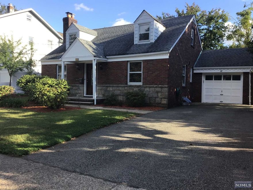 Beautifully Renovated & Move In Ready Brick and Stone Colonial Cape Cod perfect for extended family with a finished basement. Excellent location on 75X100 corner property. Main Floor offers Living Room w/ Fireplace, Modern Kitchen w/granite counters, NEW stainless steel appliances, & food disposal, Dining Rm, Sunroom, beautiful wood floors, and a Full Bath w/granite, marble, jacuzzi, and body jet water toto toilet electric bidet. 2nd floor has a separate entrance to 2 bedrooms w/wood floor under carpet, walk in closet, and full marble bath; shower w/ glass enclosure & skylight. Finished basement w/separate entrance offers a family room, a bonus room, full bath & laundry rm. Large backyard offers a patio w/gas grill, well maintained landscaping, gated concrete dog area & storage shed. One car garage w/remote opener & double driveway 4 car capacity. 2015 Roof. 2015 Central A/C. Close to NY Bus, schools, & house of worship. Taxes 11,07