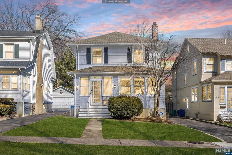 A Walk in the Park. Carteret Park to be exact. Welcome to this delightful freshly renovated 3 bedroom, 1.2 bath Colonial just one door from the park and close to the jitney to the NY train and top-rated schools. The first floor includes a large entry porch/mudroom, living room with wood-burning fireplace, formal dining room, office, the coveted powder room, and a generous brand new kitchen with stainless appliances, loads of fresh white cabinetry, quartz countertops, and hardwood floors. The kitchen opens to a huge brand-new composite deck and yard. The second floor features 3 bedrooms and a renovated full bath. The finished basement offers additional living space, laundry/powder room, and storage. New central AC/ductless AC. Freshly painted inside & out. Hardwood floors throughout. One car garage.