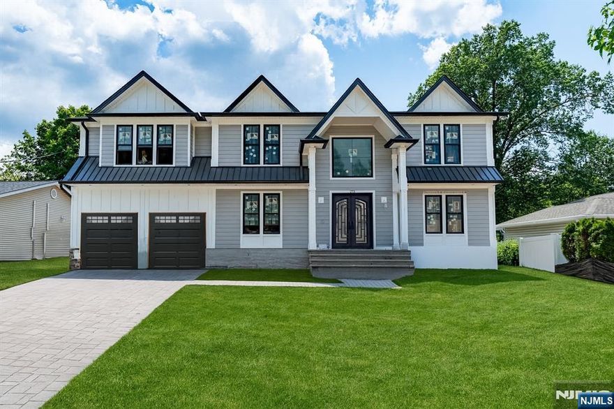 Stunning New Construction by Top Local Builder in River Edge! Experience exceptional quality and craftsmanship in this exquisite new home. Classic Center Hall Colonial layout offers timeless elegance with a thoughtful, modern floor plan. A welcoming entry foyer is flanked by a formal living & dining rooms, leading to a spacious great room w. fireplace that flows seamlessly into the chefâ€™s kitchen. Showstopping kitchen featuring professional-grade appliances, massive center island, & quality cabinetry. 1st floor includes a versatile bedroom, full bathroom, & a stylish powder room. Upstairs, retreat to the luxurious primary suite complete w. a 2nd fireplace, & a spa-inspired en-suite bath. Fully finished basement is packed with amenities, including a movie theater, private gym, large rec room, and an additional full bath. Located in the heart of River Edge, this exceptional home is close to top-rated schools, a warm & vibrant community, & convenient access to NYC via public transit. New Construction over existing foundation with partial brand new foundation.