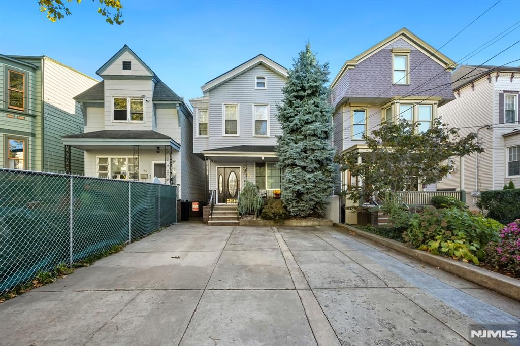 Photo of 87 Sherman Place, Jersey City, NJ 07307 (MLS # 25036970)