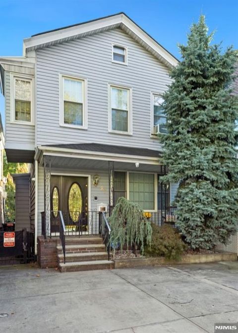 Photo of 87 Sherman Place, Jersey City, NJ 07307 (MLS # 25036970)