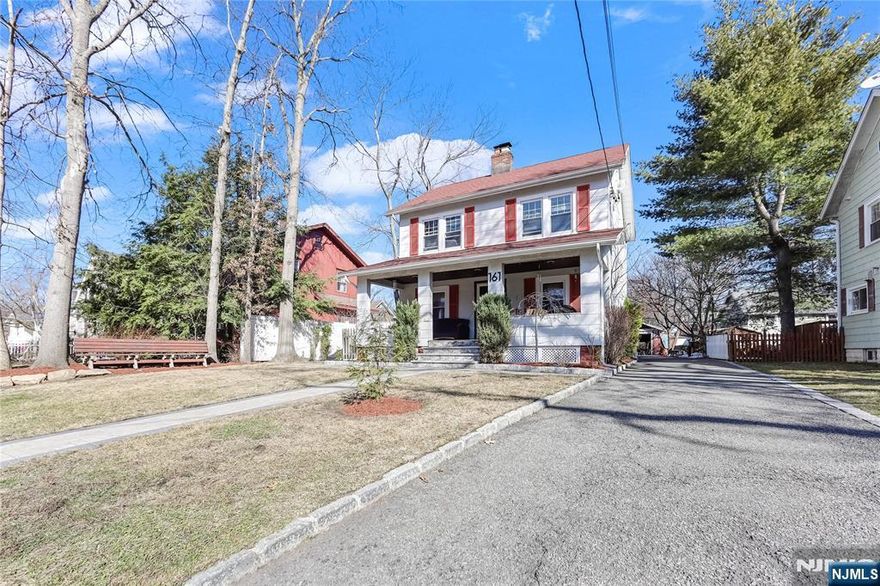 Great three-bedroom colonial on a quiet residential street, featuring a covered porch perfect for relaxing. The first floor includes a living room with a wood-burning fireplace, a dining room, and a kitchen with access to a deck and the large backyard. The second floor offers three bedrooms and a full bath. The third floor has a floored attic ready for your finishing touches. The basement includes laundry and utilities. Some newer windows on the first and second floors. Gas heating and a long driveway with a 1-car detached garage.