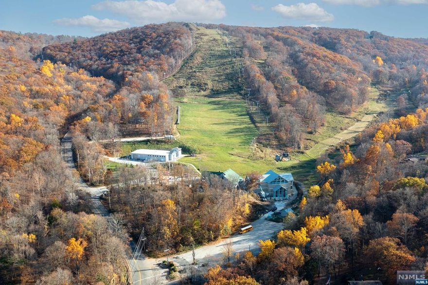 Top of the hill- On Cul de sac - BEAUTIFUL homes on the block. 1.1 mile to Mountain Creek Ski Resort. On the block of a beautiful park like setting of Nordic Center and Future home of The National Winter Activity Center formerly Hidden Valley Ski Resort. see websites