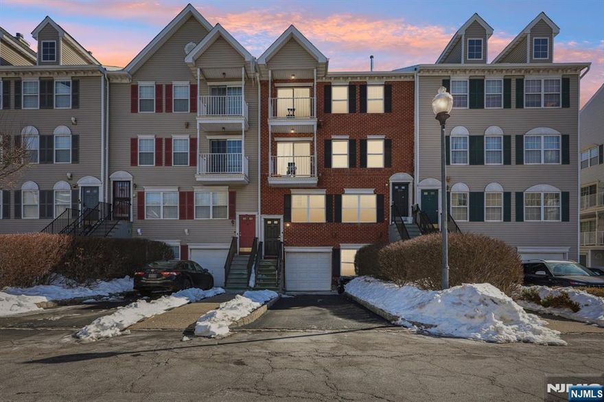 This beautifully renovated townhouse is a true commuterâ€™s dream, perfectly situated in the highly sought-after Society Hill Community. Enjoy unmatched convenience just moments from local restaurants, shopping, recreational parks, the Prudential Center, NJPAC, Whole Foods, the Newark Museum, major highways, and public transportation. Located next to Newark Penn Station, this home offers an easy NYC commuteâ€”reach Manhattan in as little as 20 minutes by train. This bright and spacious unit features an open-concept layout with three large bedrooms, three full bathrooms, and a modern kitchen seamlessly flowing into the living and dining areas. Additional highlights include a recreation room, private balcony, central HVAC for year-round comfort, and ample parking with a garage, driveway, and additional parking. Residents enjoy exclusive access to community amenities, including a clubhouse, tennis courts, swimming pool, and convenient on-site public transportation. A rare opportunity to own a fully renovated townhouse in one of Newarkâ€™s most desirable communitiesâ€”perfect for commuters and city lovers alike!