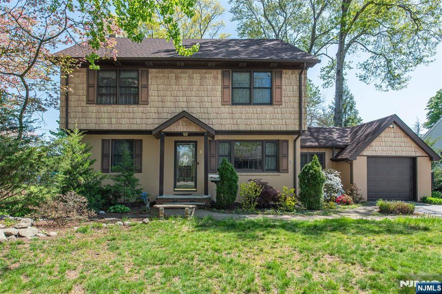Welcome to this beautifully maintained 4-bedroom, 2-bath Colonial offering comfort, space and convenience. The first floor features a bright Living Room, formal Dining Room, and an inviting Kitchen, along with a cozy Den that provides direct access to the Garage and sliding doors leading to the Deck perfect for indoor-outdoor living. This level also includes a Bedroom, full Bath, and a convenient Laundry/Utility Room. Upstairs, you'll find three generously sized Bedrooms, a full Bath, and walk-up access to the attic, offering excellent storage potential. Recent updates include a newer Septic system, Roof, Central Air and Furnace, providing peace of mind for years to come. Ideally situated on a lovely street close to schools, parks, shopping, and dining, with easy access to Routes 23, 46, 80, and 287 this home offers both tranquility and convenience. Don't miss the opportunity to make it yours!