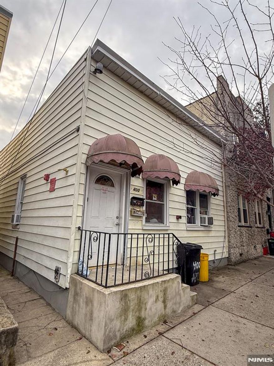 400 Cliff St, Fairview, NJ Two-Family Detached Home Live-In or Investment Opportunity Unlock exceptional value with this detached 2 family home in Fairviewâ€™s most sought-after residential section. Whether youâ€™re looking to live in one unit and rent the other or seeking a high-yield investment property, this residence offers a strategic blend of comfort, flexibility, and long-term upside. Front Unit â€“ Street-Level The front entrance sits directly off the street. Inside, Front and rear entrance, a welcoming living room, Two well-proportioned bedrooms, Eat in kitchen. Rear Unit â€“ Expanded Living Footprint The rear side entrance leads into a spacious, thoughtfully laid-out home featuring Four bedroomsâ€”ideal for larger households, extended family, or generating strong rental income. Additional Features Unfinished basement with exterior access â€” ideal for storage, mechanicals, and utility space (unit A) Tenant-occupied, month-to-month, making this a turnkey investment play Detached structure enhances privacy and noise separation between units Prime location near shopping, schools, transit, and major highways This property offers forward-looking buyers a rare chance to secure a flexible multifamily asset in a high-demand Fairview neighborhood. Whether maximizing cash flow or building equity while occupying one unit, 400 Cliff St positions you for long-term growth.