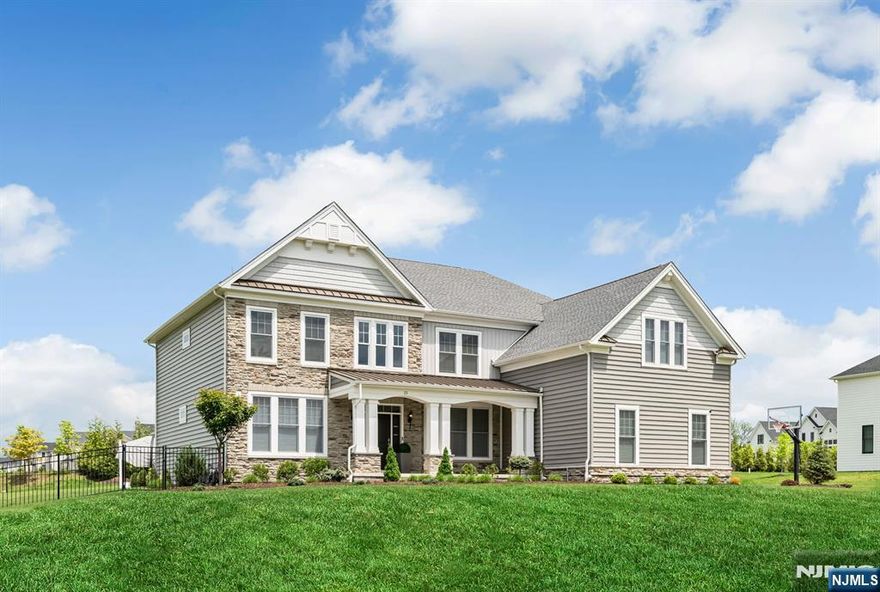 Set in the highly desirable Orchard Ridge community of Upper Saddle River, this custom built home offers a striking blend of sophistication and modern design. Only two years old, and much larger than it appears, this home defines elevated living with soaring ceilings, expansive sun-drenched spaces, and elegant finishes throughout. From the moment you step through the grand entrance, you're greeted by natural light pouring through oversized windows, highlighting the sleek design and open-concept layout. The heart of the home is the chefâ€™s kitchen outfitted with premium appliances, custom cabinetry, and a large island that seamlessly connects the living and dining areas. An entertainer's dream for sure! The primary suite is a true sanctuary, featuring two spacious custom walk-in closets and a spa-inspired ensuite bath. Additional bedrooms offer generous space, ensuite baths, and refined detailing. Step outside to your private backyard oasis, purposefully designed for entertaining. Whether hosting summer BBQs, relaxing with family/friends, or dining al fresco, the outdoor space offers both beautifully landscaped grounds and room to personalize your dream outdoor retreat. The owner has tastefully upgraded the home as well including upscale landscaping, high end custom closets, window treatments and more. With easy access to Upper Saddle River's top rated schools, dining, NYC transportation and the expansive property this extraordinary home is a rare opportunity.