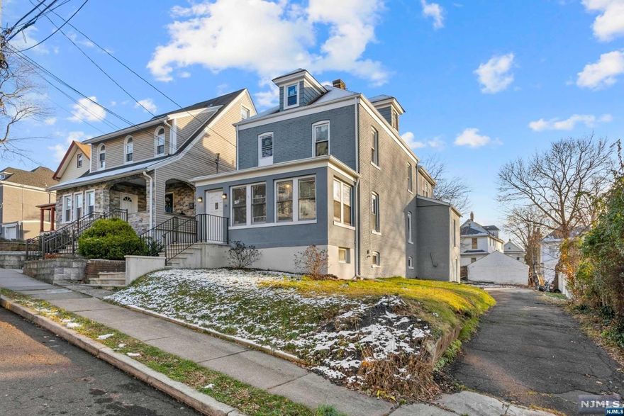 This completely renovated two family home must be seen! Located just minutes from bustling downtown Ridgefield Park and easy access to all major roadways - a true owner/renter's dream. All updates were tastefully done to retain the home's original historical character. Both units feature spacious open-concept living, fully renovated bathrooms, ample closet space, brand new windows, and glistening new flooring! Gourmet kitchens with custom black backsplash, new stainless steel appliances, marble countertops, and porcelain tile flooring! Massive full unfinished basement with separate walkout offers endless possibilities! Dedicated full driveway and rear yard area - perfect for summer BBQs! See this immaculate property today!