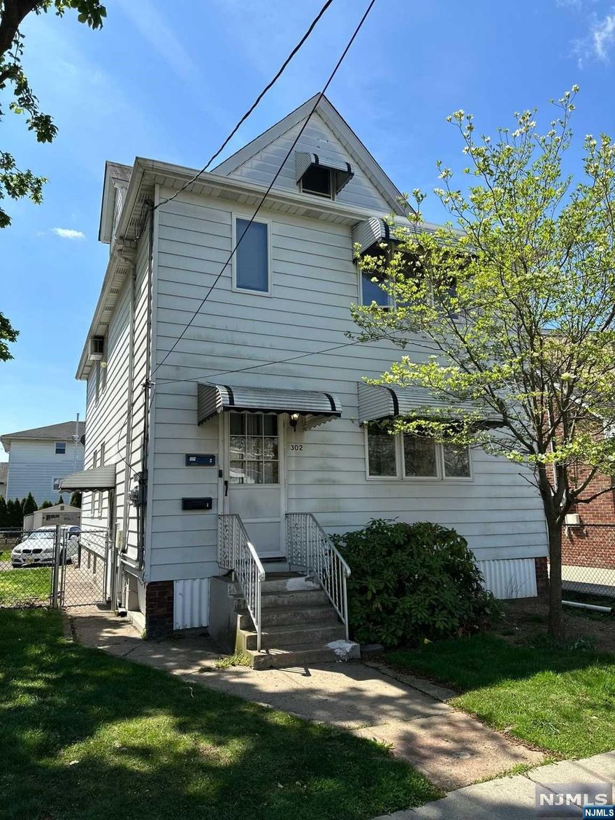 Experience the allure of Wallington living in this stunning 2-family home. Centrally located for your convenience, it's just steps away from parks, shops, restaurants, and more. Unit 1 offers 2 bedrooms, 1 bath, a living room, dining area, and kitchen. Unit 2 matches this layout, ample walkup attic that could provide additional living space, providing a perfect living opportunity in Wallington. The home features an above ground oil tank in the basement for convenience and peace of mind.