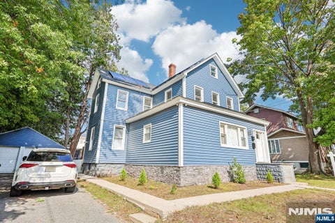 Photo of 59 Clinton Avenue, Bergenfield, NJ 07621 (MLS # 26034926)