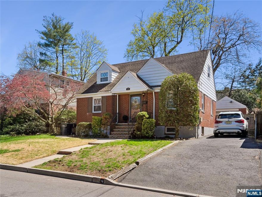 Welcome to this gorgeous and well maintained home in a quiet area. The first floor features a good size living room , dining room, 4 year renovated kitchen, bedoom and renovated bath. Upstairs and two good size bedrooms. The basement features good size play room, rec room, storage/utility room and full renovated bath. Other features of this home first floor all newer flooring and renovated stairway, renovated basement with renovated bath, brand new hot water heater, etc. Outside there's a large covered patio, detached garage and parking for several cars in the driveway. All of this close to multiple schools and shopping and one block from main road and NYC transportation.