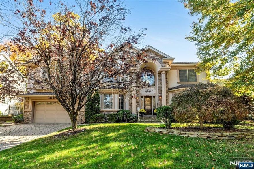 Beautiful colonial on the East Side of Paramus. Meticulously maintained since it was built, which was a new construction over new foundation. Builder's own original home and the high quality and craftsmanship is evident. This 5 bedroom, 5 full bathroom home is sitting on an oversized lot. It offers spectacular curb appeal with stucco & stone exterior. You are welcomed into the home by an oversized 2 story foyer.. Very spacious rooms. Formal LR & DR flank the foyer. Continue along to the 2 story great room w. FP. Tons of trim and millwork. Gourmet kitchen with large center island. First floor bedroom and full bathroom is a rarity! Head upstairs to the large primary suite w. spa-like bathroom & 3 addt'l bedrooms. (One is a Jr Suite) Fully finished basement with large recrooms & 5th full bath. Paramus is home to amazing schools, great shopping, & wonderful community. Easy access to NYC!