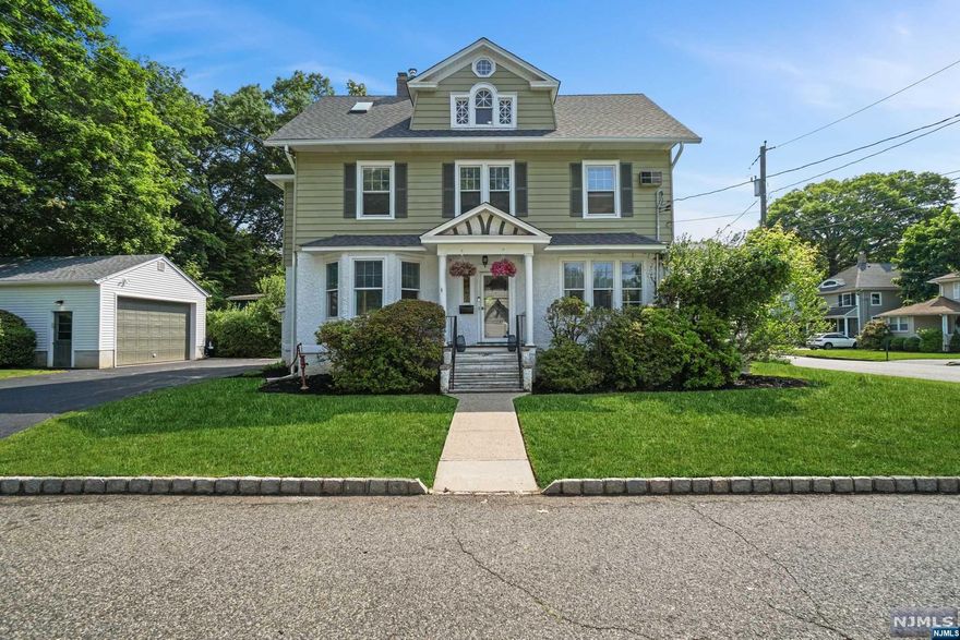 Welcome Home to one of the most desirable neighborhoods and blocks in Harrington Park. An exceptionally charming and classic Victorian Colonial Home with a private and spacious side porch. All Interior walls have been freshly painted with a neutral color palette, newly renovated kitchen including white quartz countertops, white subway glass backsplash, new kitchen floors and a separate entrance from the side driveway that leads into the kitchen. The remaining rooms have hardwood floors, generous layout, multi purpose uses & aprox 3000 Sq ft of living space. The dining room has custom built cabinetry, original exposed brick, fireplace, & stained glass window, w/plenty of natural light throughout. The serene primary suite is the perfect place to relax with a nook for chaise lounge. 2nd level includes four bedrooms to claim, personalize & enjoy. Fully finished attic provides family room,