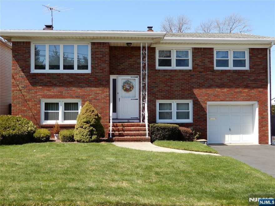 Discover the perfect blend of comfort, convenience, and style with this remarkable bi-level home. Located in a sought-after "Hill" section of Wallington. This house is very well-maintained and cared for; excellent condition of it will surpass your expectations. It is conveniently located near public transportation, various shops, parks, and schools in thriving, family-friendly neighborhoods. This three-bedroom, two-bathroom, all-brick, bi-level house has a one-car garage, a large yard, a family room with a wood-burning fireplace, and so much more. It is the perfect choice for anyone. Don't let this incredible opportunity slip away! Schedule your tour today!