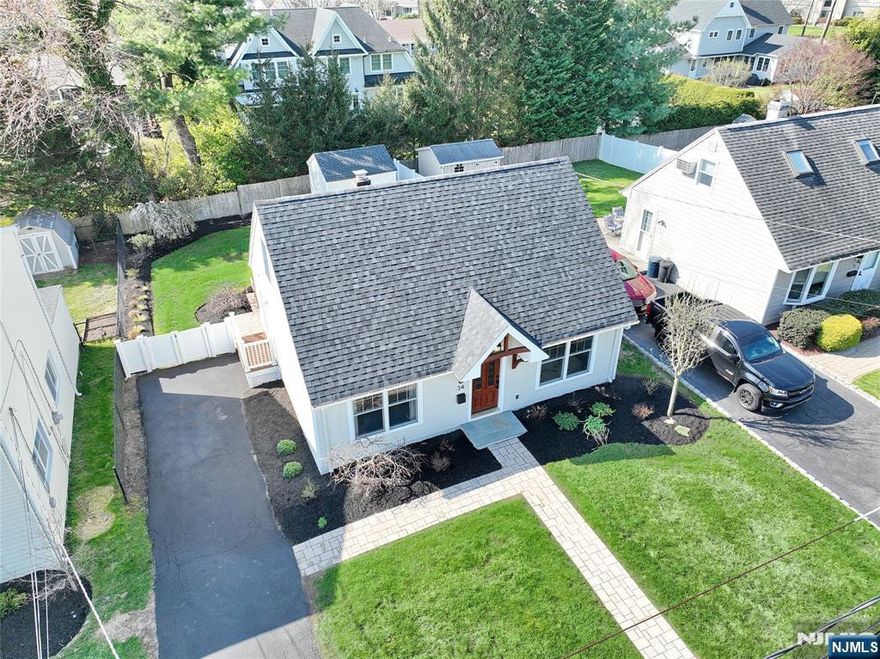 Welcome to this beautifully maintained builderâ€™s own Cape Cod, where thoughtful design meets everyday comfort. Tucked away on a quiet street in desirable Waldwick, this home offers the perfect blend of tranquility and convenienceâ€”just minutes from shopping, restaurants, NJ Transit, Route 17, and Franklin Turnpike. Inside, a stunning eat-in kitchen features quartz countertops, stainless steel appliances, and a stylish peninsulaâ€”perfect for casual dining and entertaining. Hardwood floors flow throughout, leading to a cozy living room with a modern fireplace. The first floor also offers two well-sized bedrooms, a full bath, and a convenient laundry area. Upstairs, youâ€™ll find a spacious primary bedroom along with a versatile bonus space ideal for a home office, walk-in closet, or private retreat. Enjoy the outdoors in the large backyard, perfect for entertaining or relaxing, complete with a fire pit and grille on the patio, ideal for gatherings year-round, as well as a spacious storage shed. A driveway fits up to three cars for added convenience. With central air, forced hot air heat, a brand-new roof, and durable Hardie Plank siding, this home is truly move-in ready and low maintenance.