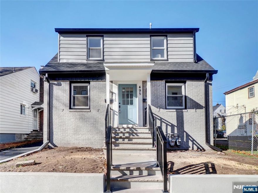 Welcome to this immaculate, fully renovated two-family homeâ€”a perfect turnkey investment or owner-occupied residence! Both units feature beautiful open-concept layouts, gleaming hardwood floors, and an abundance of natural light. The spacious living areas flow seamlessly into gorgeous modern kitchens equipped with quartz countertops, breakfast bar overhangs, and stainless steel appliances. Each floor offers two fully redone bedrooms and a luxurious, spa-inspired full bathroom. The first-floor unit is a true standout, offering a "duplex-style" layout that connects to a fully finished basement. This lower level significantly expands the living space, featuring a recreation area, a second full bathroom, a mechanical/laundry room, and a separate rear entrance for added privacy. The second-floor unit ensures maximum convenience with its own in-kitchen laundry hookup. Enjoy total peace of mind with brand-new HVAC systems, water heaters, and roof shingles. The exterior is just as impressive, featuring a driveway, a spacious backyard, and a recently renovated, oversized 2-car garage.