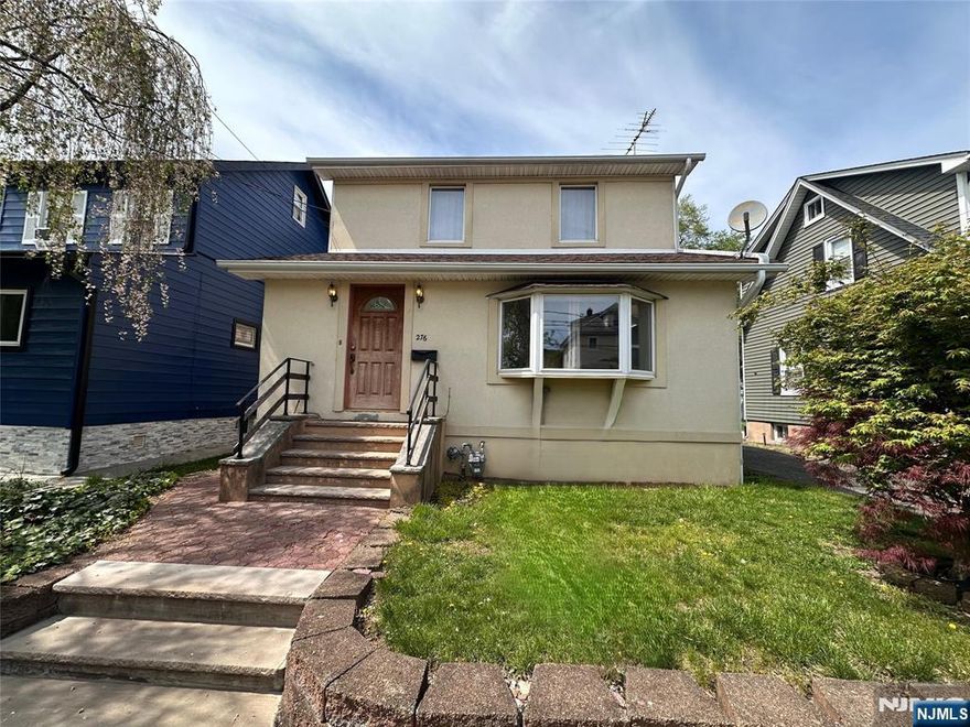 This fully updated residential home combines comfort and space. Move-in ready, it features 3 generously sized bedrooms, a full bathroom with a jacuzzi tub and standing shower, along with two additional half baths for added convenience. The main level boasts a spacious and inviting living room, a formal dining room, and an updated kitchen designed for both everyday living and entertaining. Recessed lighting throughout the home adds a clean, modern touch. A fully finished basement provides additional living space, ideal for a recreation room, home office, or guest area. The walk-up attic offers excellent storage and future potential. Enjoy year-round comfort with central air conditioning and forced heat. Outside, the property features a shared driveway entrance leading to a private parking area in the rear, a backyard perfect for outdoor enjoyment, and a separate storage shed for added storage.A well-maintained and thoughtfully upgraded home, ready for its next owner.