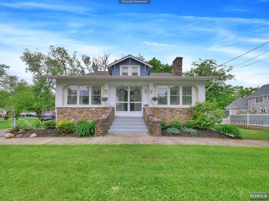 Don't miss out on this Charming Country Cottage located on a large corner lot in one of the most sought-after towns called Pompton Plains! This home boasts 4 bedrooms and 2 full baths. Enter the home from the sun-filled & enclosed front porch. The first floor offers a spacious living room, dining room, full bathroom, master bedroom and kitchen complete with hardwood floors. The second floor features 3 bedrooms and a full bathroom. Partially finished basement and ample storage throughout. Two car detached garage with tons of parking. NYC bus within walking distance, close to shopping, and walk to schools.