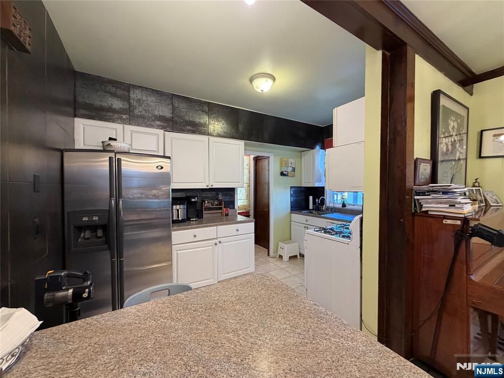 Photo of 61 Homestead Avenue, Palisades Park, NJ 07650 (MLS # 25040993)