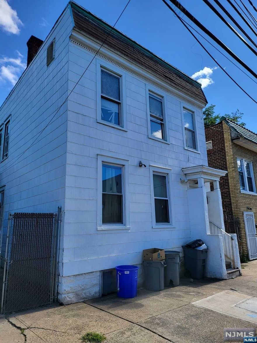 Great investment property with low taxes. Two-unit house featuring unit 1: 2 bedrooms, eat-in kitchen, living room, 1 bath; unit 2: 3 bedrooms, eat-in kitchen, living room, 1 bathroom. Rents: Unit 1: $1200; Unit 2: $1300. Sold as Is. Buyer responsible for all city certificates. Seller not responsible for vacating apartments.