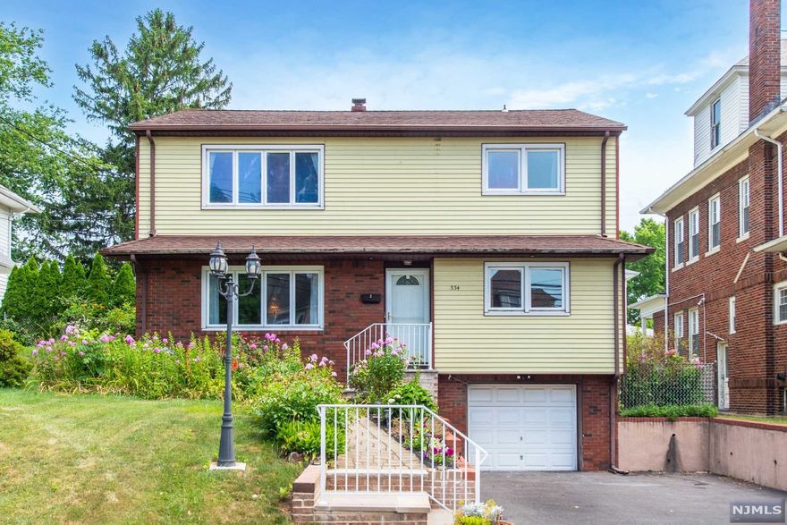 Desirable multi family home in excellent condition ready to move right in! First floor features bright and airy space with living room and dining room, granite kitchen. 3 bedrooms including a master bathroom and full bath on first level. Second floor has 2 bedrooms, 1 full bathroom and living room/dining room and kitchen. Nicely finished basement with full bathroom. Home is very well maintained and pride of ownership obvious. Bonus finished basement with summer kitchen and 1 car attached garage. Stunning patio off first floor kitchen perfect for entertaining. Close to houses of worship, public transportation and shopping.