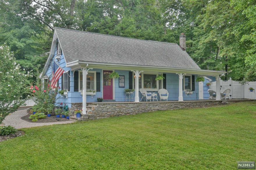 This lovely 3 bedroom, 1 bath Custom cottage is located in desirable Cupsaw Lake. A covered lemonade porch with a stone patio welcomes visitors into this charming home. Brimming with character it features, oak floors, custom moldings and built-ins, wainscoting, French doors and a brick wood-burning fireplace. A bright and sunny kitchen offers painted cabinets and stainless steel appliances. The dining room and living room have large bay windows. The first floor houses a Master bedroom with a walk-in closet and a second bedroom. The spacious third bedroom and an office can be found on the second floor. Situated on a beautiful lot with mature plantings close to Cupsaw Lake amenities. Cupsaw Lake membership is optional. Fireplace & sprinkler system in â€œAs Is" condition.