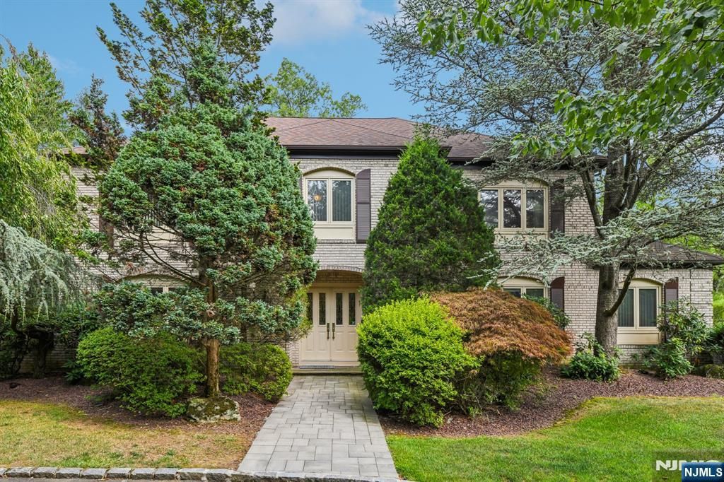 Photo of 12 Sandalwood Drive, Livingston, NJ 07039 (MLS # 26019062)