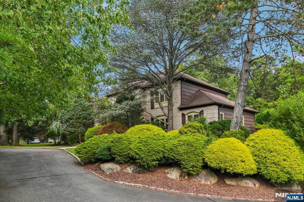 Photo of 12 Sandalwood Drive, Livingston, NJ 07039 (MLS # 26019062)