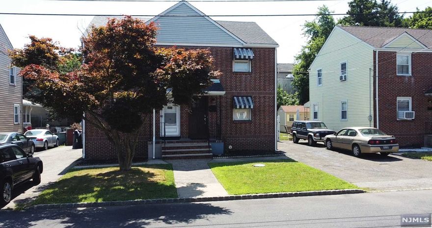 Better than a Condo or an Apartment. Enjoy your own Deck, Yard, Driveway & A 1 Car Detached Garage. This Unit is A Recently Updated & Meticulously kept Brick Duplex. Featuring a 1st Fl with Newer Kitchen, Dining Room, Living Room with walk out Deck to the backyard. 2nd Fl features 2 Large Bedrooms, Newer Full Bathroom & a Finished Attic for Office Space or Storage. Home Features, Newer Kitchen w/ Stainless Steel Appliances, Roof, Refinished Hardwood Floors, Finished Basement, Newer Central Air System & Hot Water Heater. Enjoy Peace and Tranquility in a Fenced off Backyard and private Deck. Near, Bus Mass Transportation, Close Shops, Restaurants, Schools, Parks, and Houses of Worship and within 10 minutes of 3 Train Stations. This One won't Last.