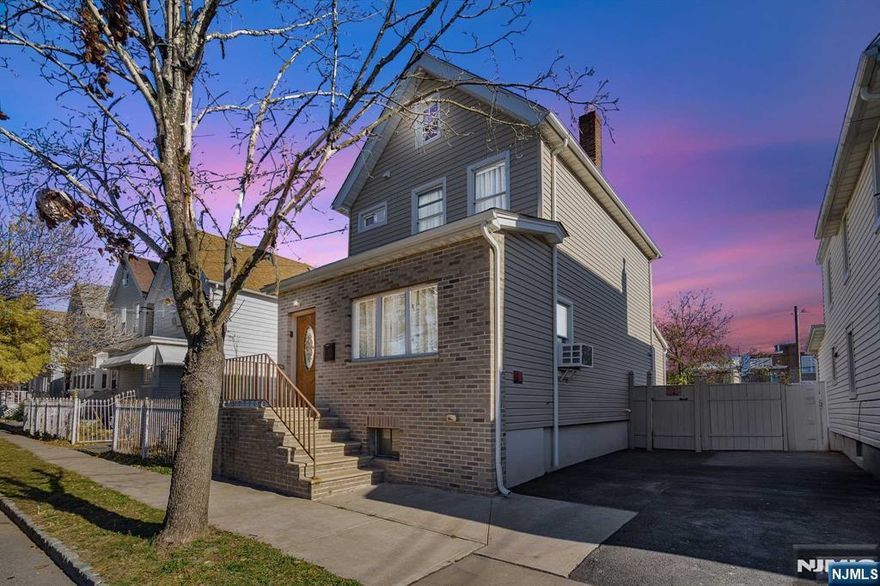 Welcome to this charming three-bedroom, one-and-a-half-bathroom colonial home with an inviting open floor plan. The property boasts a recently finished basement, completed within the last two years, along with a new roof. The backyard is an outdoor oasis, featuring a pergola deck, built-in grill, and full fencing for privacy. You'll also enjoy a finished attic, perfect for extra space. Located just a 0.3-mile walk to the Grove Street Light Rail Station and a 0.7-mile walk to the nearby train station with direct access to New York City, this home is truly move-in ready!