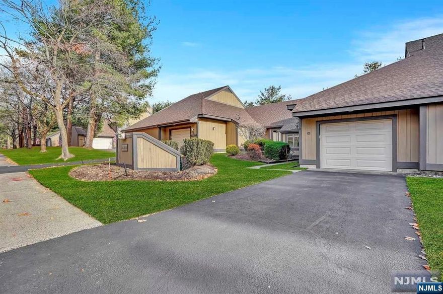 H&B due 5pm 12/12/24. Welcome to Spring Meadows, Wyckoff's most sought-after 55+ community, where comfort meets timeless charm. This Vail Unit offers a bright, roomy space. Step into the inviting foyer leading to an open-concept living and dining area, perfect for relaxing or entertaining. The living space flows to a private patio, ideal for tranquil mornings or unwinding amidst meticulously cared-for lawns. The EIK features stainless steel appliances and plenty of space for preparing meals. The spacious bedroom includes a walk-in closet and an extra double closet for abundant storage. The bath is beautifully appointed with double sinks, a vanity area, a raised toilet, and handicap features for comfort. With in-unit laundry, attic storage, and an oversized garage, this home blends charm and practicality. Spring Meadows offers a clubhouse, tennis courts, and bocce court, fostering a warm, active community. Conveniently located near shopping, dining, the YMCA, and more.