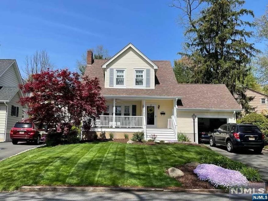 Located on a quiet, tree-lined, Wyckoff Street, this lovely side stair 3-bedroom 1.5 bath colonial with a charming, covered porch is ready for you to unpack and enjoy a glass of lemonade. Entering this home, you can't help but notice the wood floors flowing through the living and dining rooms. A woodburning fireplace encourages gathering on a snowy evening. Need hot chocolate? The newer kitchen with granite and stainless-steel appliances will make a smile as you view the private yard through the wall of windows. A finished basement is ready for fun and games. Additional features include central a/c, steam heating, and an attached garage with storage loft. It is conveniently located close to shopping, 2 bus lines & award-winning schools. Call me today for a private tour.