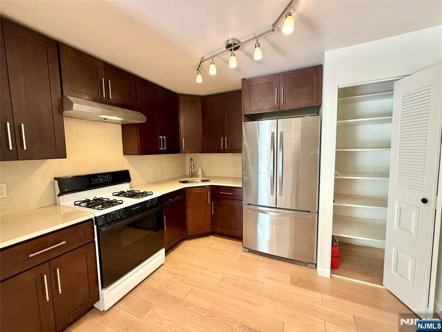 Society Hill unit located across from the Pool + Tennis Courts + kids playground and the clubhouse for endless summer fun. Apartment features modern finishes with Hardwood floors throughout. Renovated Eat-In Kitchen with Espresso Cabinets, Quartz Countertops, Stainless Steel Appliances and a pantry for extra storage. Spacious Family Room with balcony access through sliding glass doors to enjoy the serene greenery and the pool view . Hall bathroom has sleek floor to ceiling tiles, and modern fixtures. Master Bedroom has a walk-in closet with attic for extra storage that we all need! In unit laundry room with added shelves for storage. enjoy the amenities include club house, swimming pool, tennis, endless bike rides and plenty of visitors parking. Located near the library, schools, strip mall and Darlington Park for hiking, skiing and lake beach activities. Quick access to Rt 17. Express bus stop to NYC on Ridge Rd.