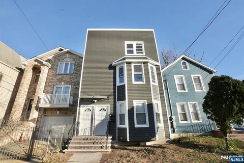 Photo of 216 Peshine Avenue, Newark, NJ 07108 (MLS # 25041661)